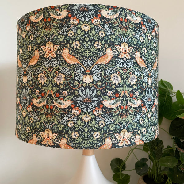 William Morris strawberry thief marine fabric on bespoke lamp shade, handcrafted in NZ. Close up, unlit.